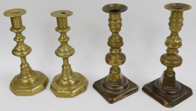 A selection of brass candlesticks, mainly singles but one pair. (a quantity) - 4