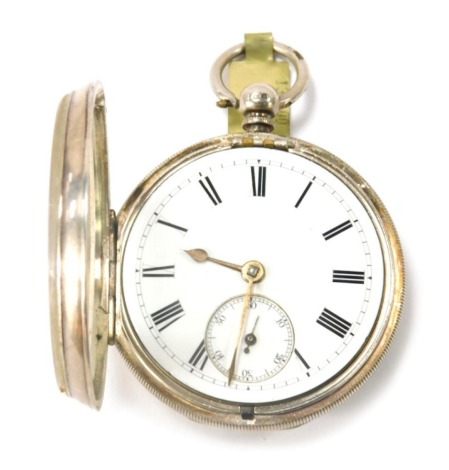 A Victorian silver pocket watch, with white enamel Roman numeric dial with gold hands and seconds dial, with engine engraved decoration and vacant shield, key wind, Chester 1895, maker JH&S, 130.5g all in.