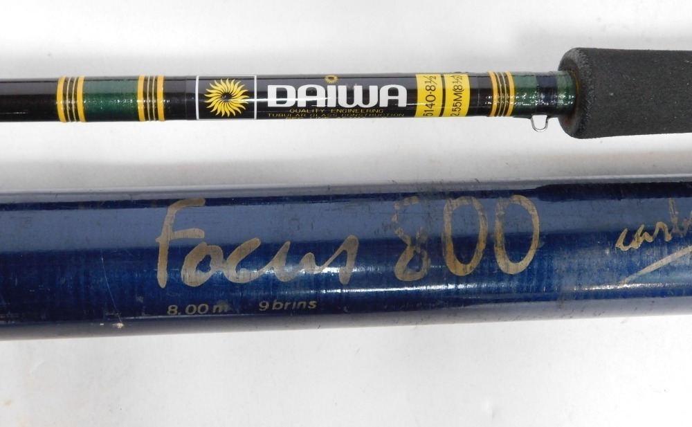 A Daiwa fly fishing rod, three piece split cane fly fishing rod, fishing umbrella, a Shakespeare A Daiwa fly fishing rod, three piece split cane fly fishing rod, fishing umbrella, a Shakespeare