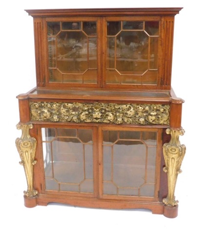 A late Victorian parcel gilt and satin wood glazed display cabinet, with astragal glazed top and base having rococo scroll central frieze, 153cm high, 123cm wide, 63cm deep.