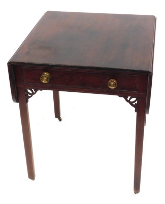 An 18thC mahogany Pembroke table, with frieze drawer, fret work inset and chamfered legs, 110cm wide max, 63cm deep.