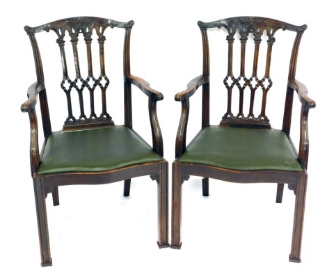 A pair of 19thC Gothic Chippendale style carver chairs, with drop in seats, 63cm wide.