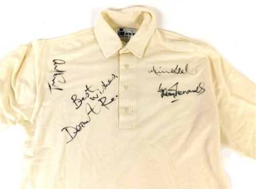 A Gunn & Moore Cricket jersey, signed by the England cricketer Dermot Reeve, also bearing three further signatures.