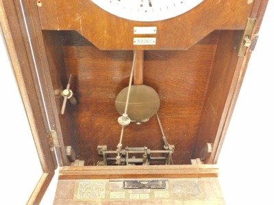 A 20thC Gledhill-Brook oak cased time recorder clock, the 25cm diameter Roman numeric dial, in oak case with metal fittings, 121cm high. - 3