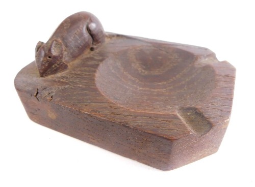 A Robert Thompson of Kilburn Mouseman oak ashtray, of rectangular form with rounded and canted corners, in dark patinated oak, 10cm long, 7cm wide.