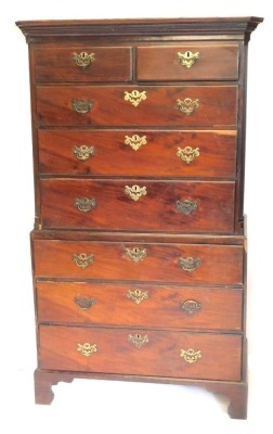 A George IIII mahogany chest on chest, having moulded cornice, canted top with two short and three long graduated drawers, and three further drawers to the base, with pierced brass back plate handles, and bracket feet, 179cm high, 110cm wide, 54cm deep.