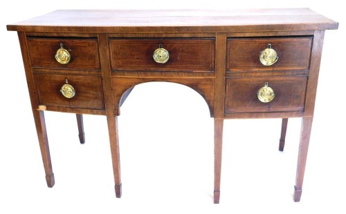 A 19thC mahogany bowfront sideboard, the central drawer flanked by four further drawers, on square tapering legs terminating in spade feet, 93cm high, 151cm wide, 60cm deep.