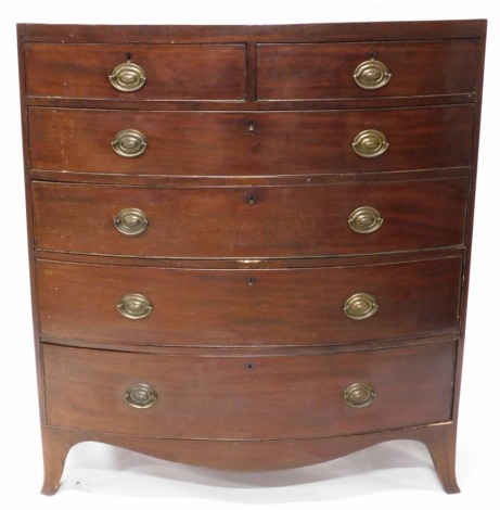 A George III mahogany bow front chest, of two short and four graduated drawers, with brass oval back plate handles and splay feet, 107cm wide.