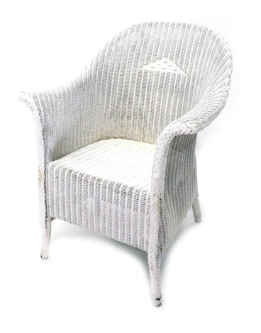 A Lloyd Loom style tub chair, painted cream, with a central lattice design decoration, 84cm high.