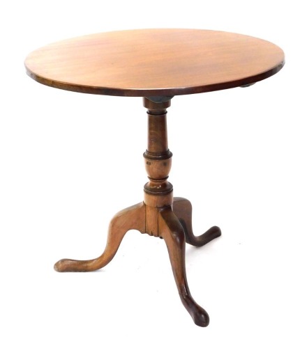 A 19thC and later mahogany occasional table, the plain circular tilt top on baluster stem, terminating in tripod base, 73cm high, 75cm diameter.