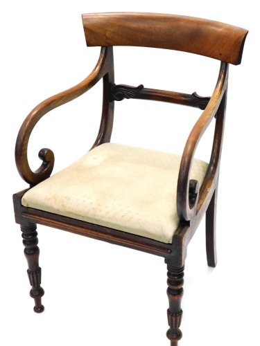 A 19thC mahogany carver chair, with a horizontal scroll splat, a drop in seat and later lattice material, on turned and reeded front legs, 88cm high.