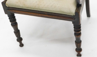 A 19thC mahogany carver chair, with a horizontal scroll splat, a drop in seat and later lattice material, on turned and reeded front legs, 88cm high. - 2