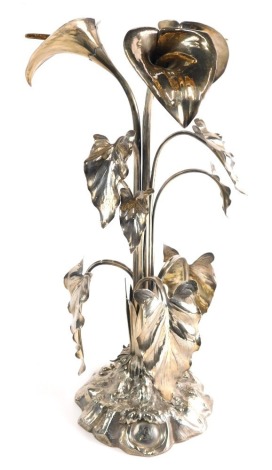 A 19thC silver plated floral centrepiece, with entwined stems, on a shaped base, initialled GER, 49cm high.