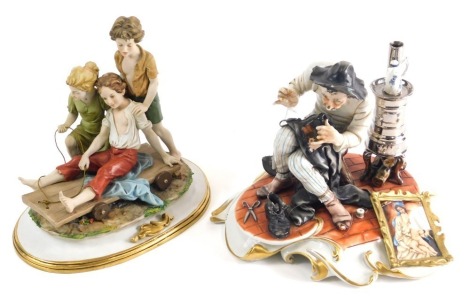 A Capodimonte figure of a gentleman sewing, and a further figure group of children on a gilt lined base, 19cm high. (2)