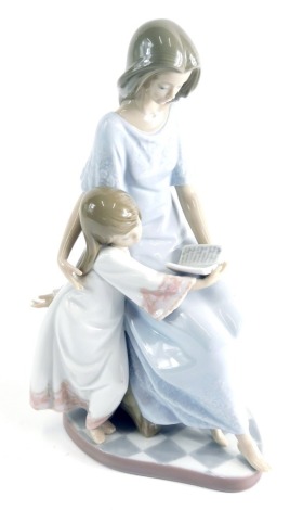 A Lladro figure, Cuentos par Dormir number 05457, printed marks beneath, 24cm high, boxed.