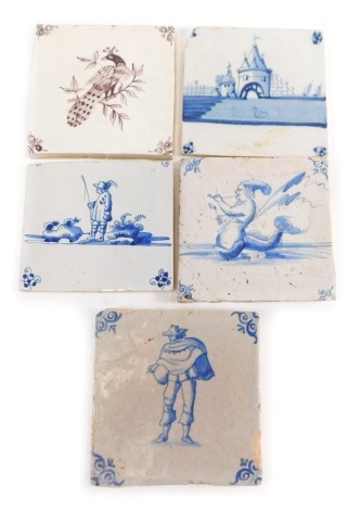 An 18thC tin glazed earthenware tile, decorated with bird on a flowering tree bough, 13cm x 13cm and further Dutch Delft tiles, including 17thC mermaid, 18thC fisherman, castle and figure. (5)