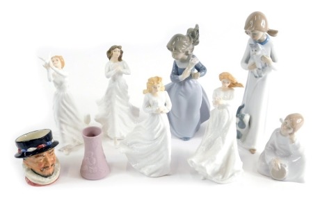 Various Royal Doulton figures, miniature character jug, Beefeater, Loving You and other lady figures, Nao figure of an angel holding tambourine, 12cm high, etc., printed marks beneath. (a quantity)