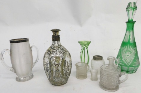 Various glassware, an inverted Haig's Dimple style decanter, etched with thistles, with plated mounts and lid, 22cm high, various other moulded glass, green swirl glass vase, two handled ribbed glass vase, etc. (a quantity)