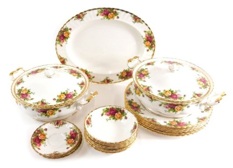 A Royal Albert Old Country Roses part dinner service, comprising two lidded tureens, 31cm wide, dinner plates, oval meat plate and saucers. (a quantity)