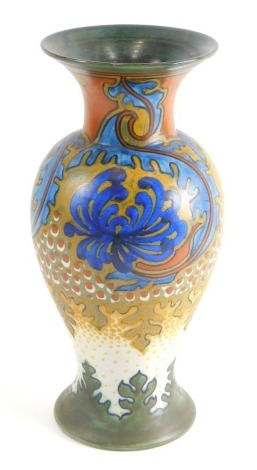 A Sama Gouda Dutch pottery vase, of shouldered form, profusely decorated with flowers predominantly in orange, blue, green and yellow, marked beneath, 30cm high.