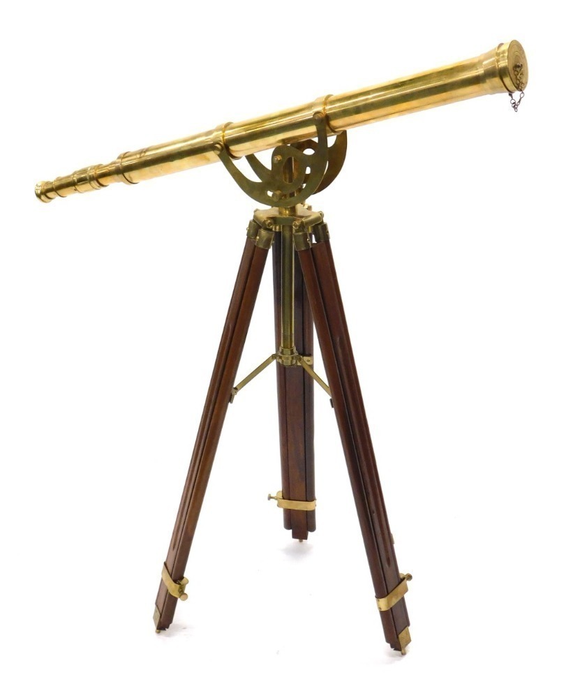 A modern Stanley London 1885 model brass telescope, on a wooden and brass  tripod stand, 102cm