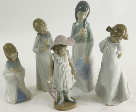 Five various Nao figures, to include girl dressed in finery holding umbrella, 18cm high. (5)