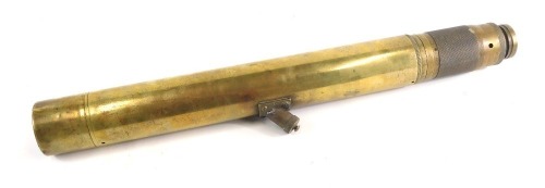 An early 20thC Ottway and Co Limited Ealing brass gun sight, of cylindrical form, with articulated lattice work end, marked NR17, with crow foot mark and central mounting section, 57cm long.