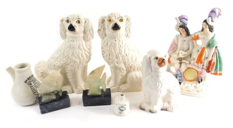 Various 19thC and other Staffordshire pottery, a pair of spaniels, in white with gilt highlights, pair of Highland figures with musical instruments, 33cm high, further Staffordshire dog, fish ornament, and a Dr Nelson's Improved inhaler. (a quantity)