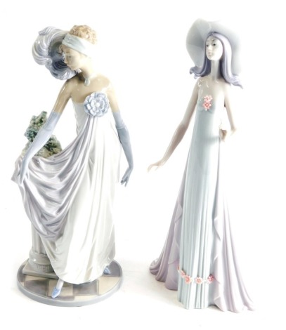 A Lladro figure of a lady, in Art Deco flowing robes, aside pillar of flowers, printed marks beneath, 36cm high, and a further Lladro figure of a lady, Debutant, 01431, printed marks beneath. (2)