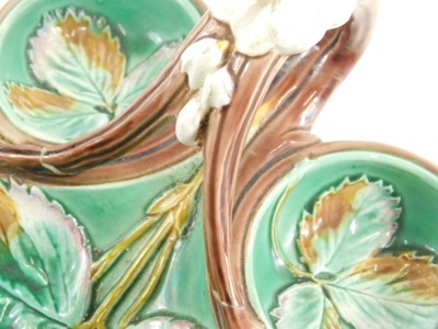 A late 19thC Wedgwood majolica strawberry dish, florally decorated predominately in green, white and brown, floral handle, with diamond registration mark beneath, 20cm wide. - 2