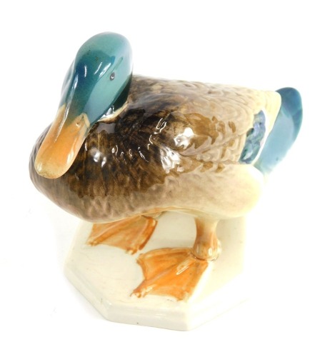 A Beswick pottery figure of a duck, number 817, impressed marks beneath, 20cm high.