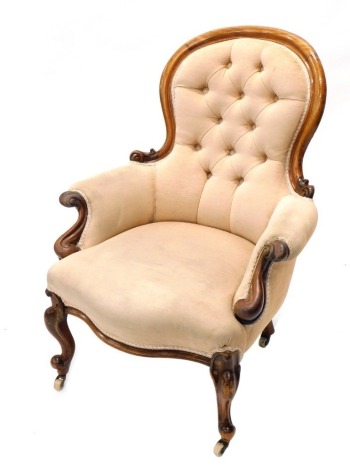 A 19thC mahogany show frame button back armchair, with shaped scroll arms, serpentine front, inverted cabriole legs terminating in casters, in later cream material, 103cm high.