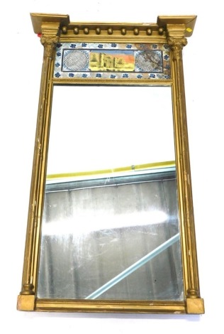 A 19thC gilt gesso , with a glazed verre eglomise top decorated with castle, with floral outline above a plain glass, flanked by quarter columns with an inverted beaded front, 108cm high, 64cm wide, 12cm deep. (AF)