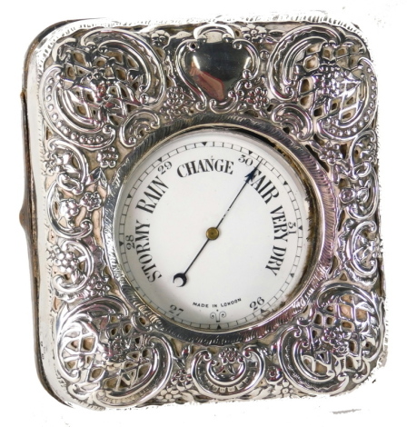 A silver plated pocket barometer, with white enamelled dial, stamped Made in London contained in a leather and silver mounted travelling case, London 1919.