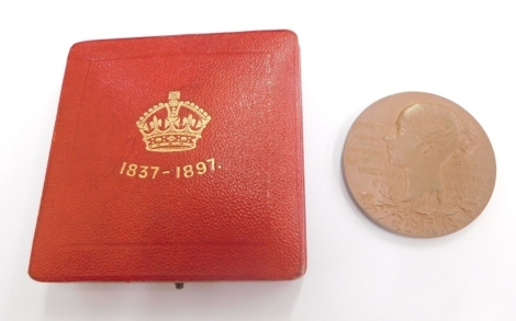 A Queen Victoria Diamond Jubilee bronze medallion, 1837-1897, 6cm diameter, in outer red Moroccan style case with gilt stencilling.