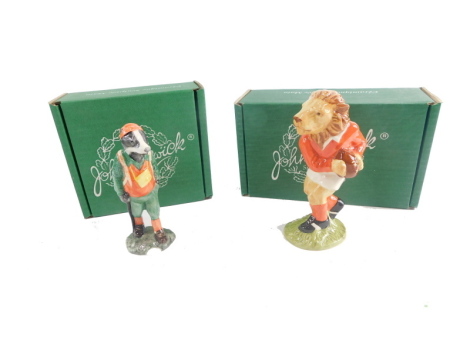 A Beswick figure Hiker Badger, limited edition number 681/1000, and another, Royal Doulton The Sporting Characters Collection Last Lion of Defence, number 249, printed marks beneath, 17cm high. (2, in associated boxes)