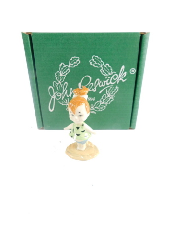 A John Beswick figure Pebbles Flintstone, printed marks beneath, 10cm high, boxed.