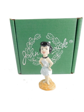 A John Beswick figure Betty Rubble, printed marks beneath, 10cm high, boxed.