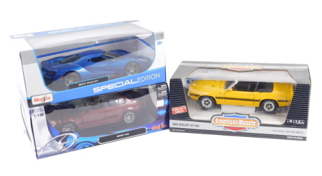 Three boxed diecast cars, to include American Muscle, 1/18 scale Shelby GTI from 500, 25cm wide, etc. (3, boxed)