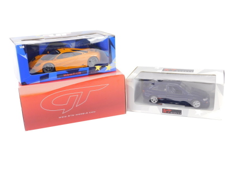 Three various boxed diecast cars, to include UT models Mclaren F1 GTR 1:18 scale, 23cm wide, etc. (3, boxed)