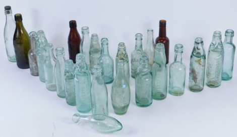 Various glass bottles, early 20thC and later, marble topped Lee and Green Limited Sleaford and Spalding, 25cm high, various other green glass and dark glass bottles, some with local interest, Soulby Sons and Wingh Limited Boston, with anchor decoration, e