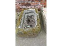 Stone garden trough with rounded end