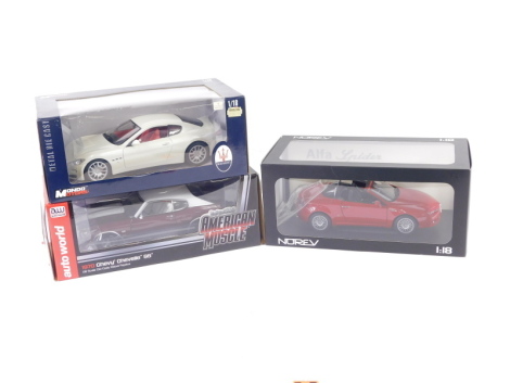 Three various boxed diecast cars, to include America Muscle 1970 Chevy Chevelle SS, 1:18 scale, 24cm wide, etc. (3, boxed)