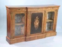 A mid Victorian walnut and marquetry breakfront side cabinet with gilt metal mounts