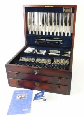 A comprehensive Elizabeth II canteen of silver cutlery, by Carrs for Harrods, Rat tail pattern in Holbrook canteen, with settings for twelve to include fish eaters, knives, forks, sharpening set, dessert spoons, teaspoons and other serving pieces, 176.48o