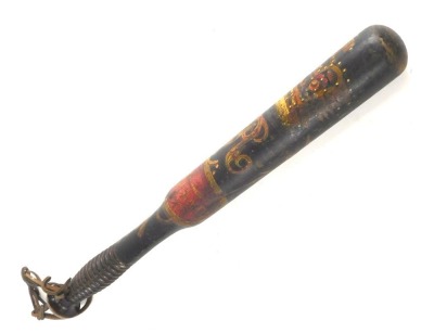 A Victorian painted truncheon, marked VR surmounted by a crown, with South Holland crest, with turned handle and leather strap, 45cm long.