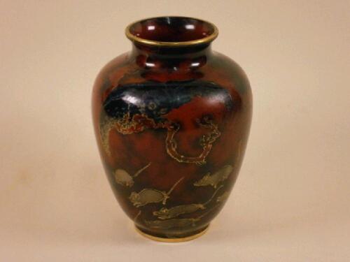 A Bernard Moore flambe vase decorated with an owl on a branch above running mice