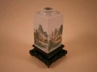 A Chinese square section vase decorated in famille rose and famille verte