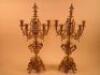 A pair of French gilt brass six branch candelabra each decorated with grapes