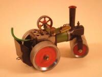 A Mamod model of a vintage steam roller painted in green
